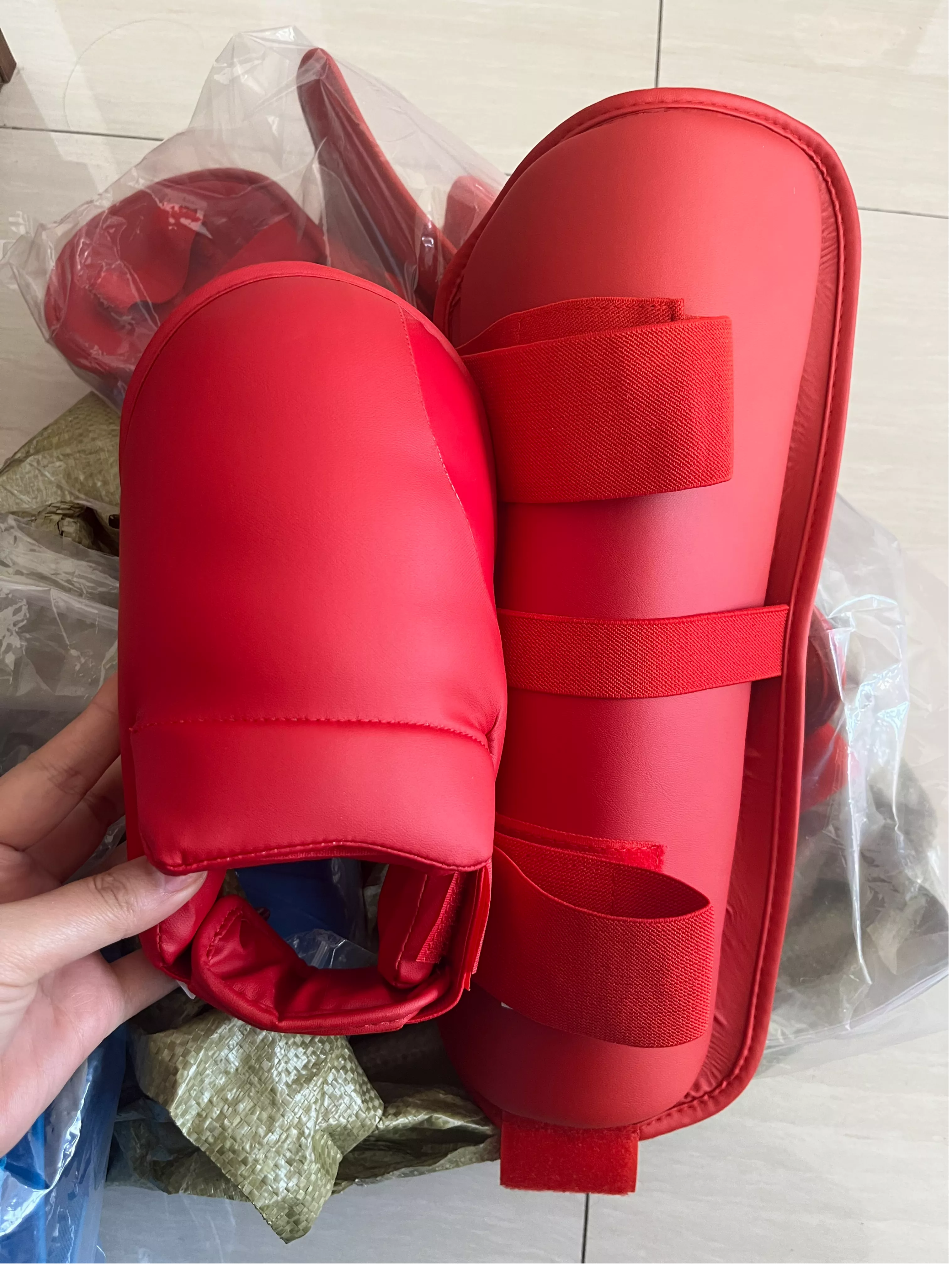 Karate shin and instep guard showing shin protection with adjustable calf straps